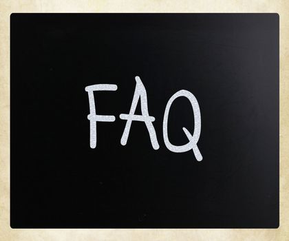"FAQ" handwritten with white chalk on a blackboard