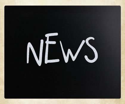 "News" handwritten with white chalk on a blackboard