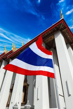 Thailand flag and Buddhist temple Wat Pho. Bangkok, Thailand