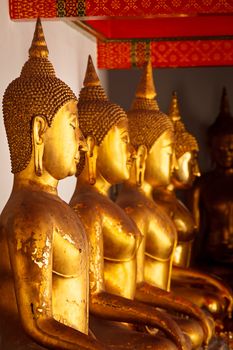 Sitting Buddha close up statues close up. Wat Pho temple, Bangkok, Thailand