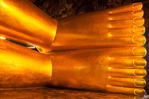 Reclining Buddha statue feet close up. Wat Pho, Bangkok, Thailand
