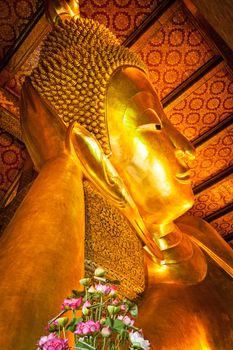 Reclining Buddha face. Wat Pho, Bangkok, Thailand