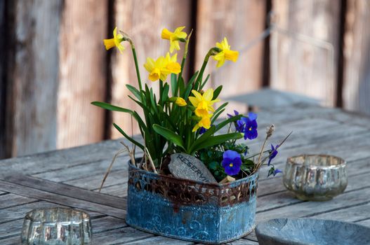 bouquets of daffodils as easter decoration on table with reserved sign