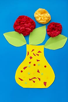 application from the paper flowers on a blue background