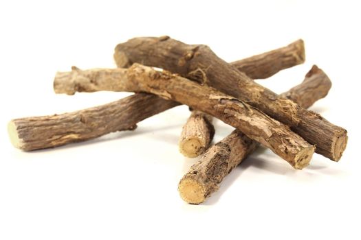 some pieces of licorice on a white background