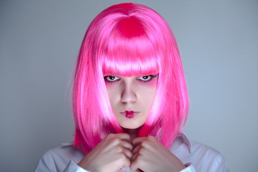 Portrait of young woman with Japanese make-up, studio shot  