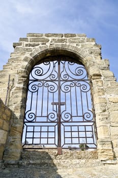 vast medieval gateway in Chateauneuf du Pape in Provence, France