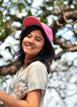 Portrait of a young asian beautiful woman on the nature 