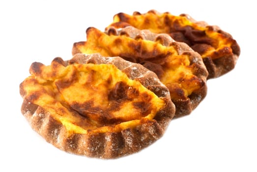 The traditional Finnish pastries with rice on a white background.