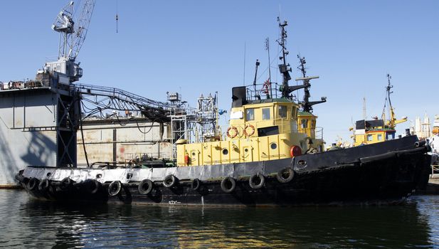 Tug boat costs in port at a mooring