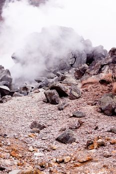 A valley of geysers in japanese mouintains
