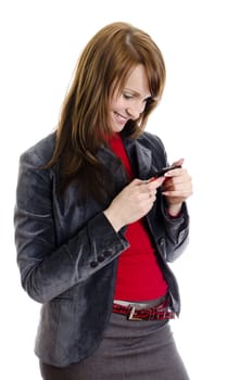Business woman writing an sms. Isolated on white.