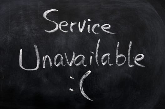 Service unavailable written on a blackboard background