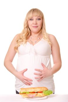 Emotional pregnant woman with huge sandwich isolated on white