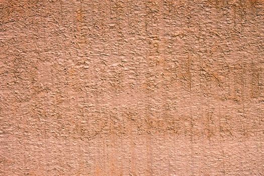 Detail of wooden desk painted in light brown. Close-up