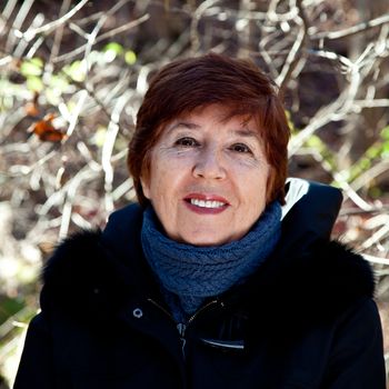 Portrait of a smiling happy mature older woman.