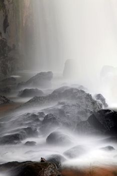 closeup of waterfall on the rock in forest