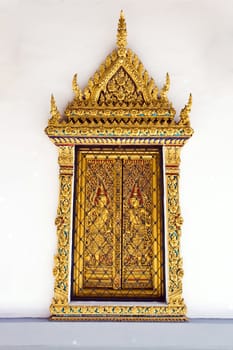 Golden Windows at Wat Phra Keao Temple in Grand Palace, Bangkok Thailand