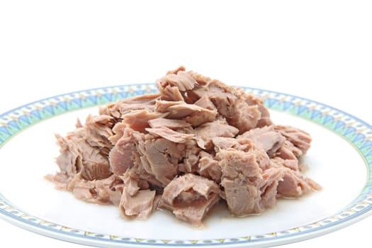 tuna fish meat in dish for cooking isolated on white background
