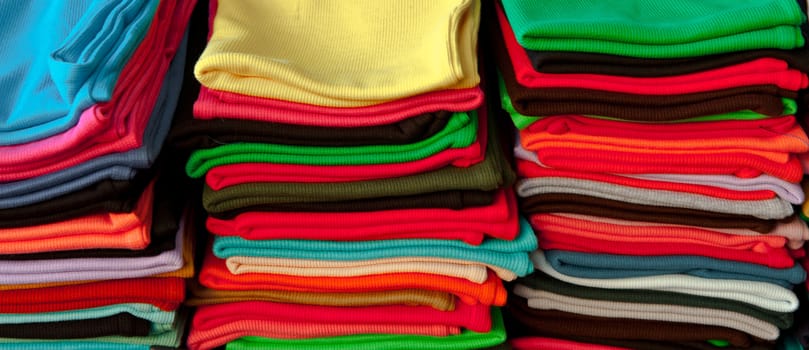 Colorful T-shirts on the Counter for Sale