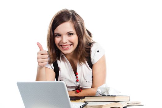 Portrait of a young and beautiful girl student who is preparing for exams