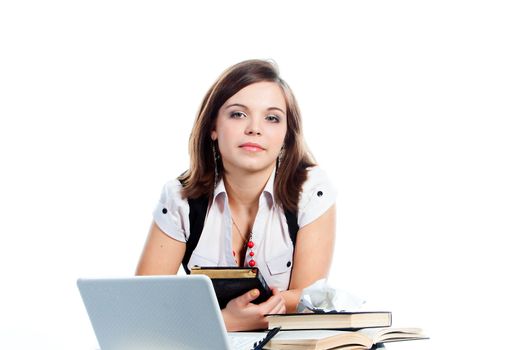 Portrait of a young and beautiful girl student who is preparing for exams