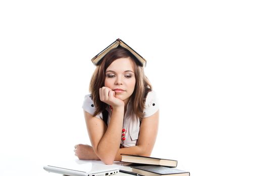 Portrait of a young and beautiful girl student who is preparing for exams