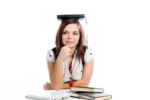 Portrait of a young and beautiful girl student who is preparing for exams