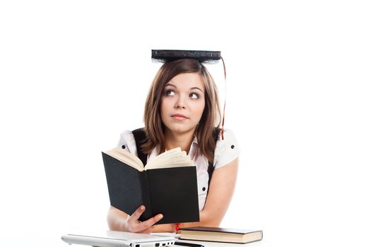 Portrait of a young and beautiful girl student who is preparing for exams