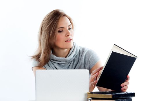Portrait of a young and beautiful girl student who is preparing for exams