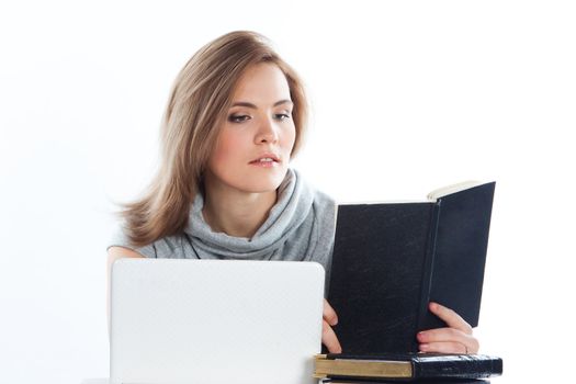 Portrait of a young and beautiful girl student who is preparing for exams