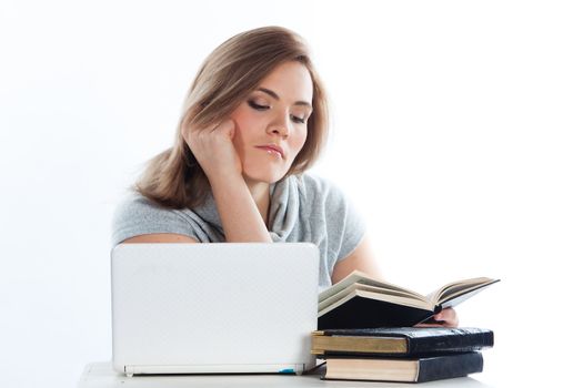 Portrait of a young and beautiful girl student who is preparing for exams