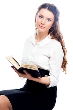 Portrait of a young and beautiful girl student who is preparing for exams