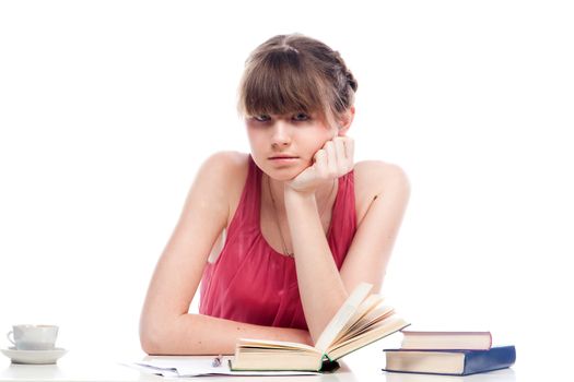 Portrait of a young and beautiful girl student who is preparing for exams