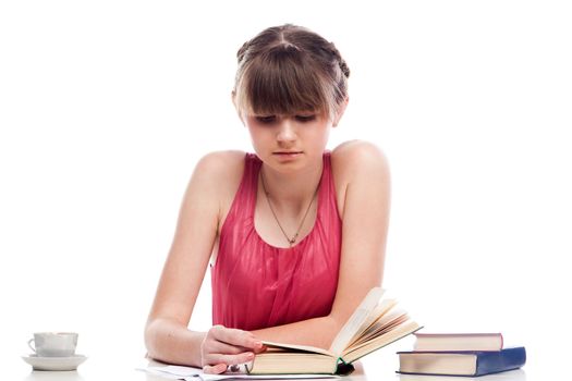 Portrait of a young and beautiful girl student who is preparing for exams