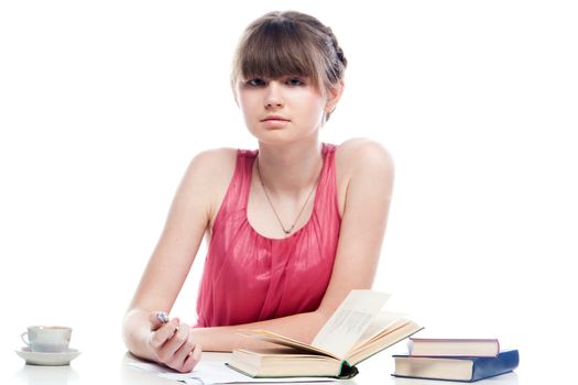Portrait of a young and beautiful girl student who is preparing for exams