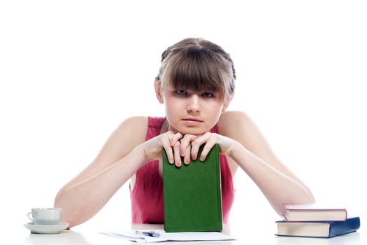 Portrait of a young and beautiful girl student who is preparing for exams