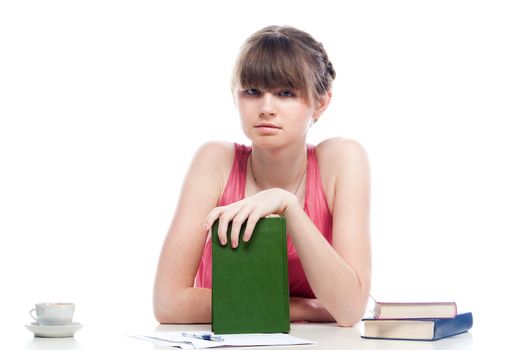 Portrait of a young and beautiful girl student who is preparing for exams