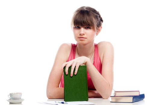 Portrait of a young and beautiful girl student who is preparing for exams