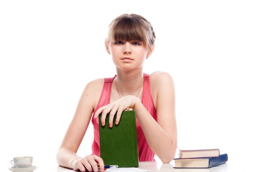 Portrait of a young and beautiful girl student who is preparing for exams