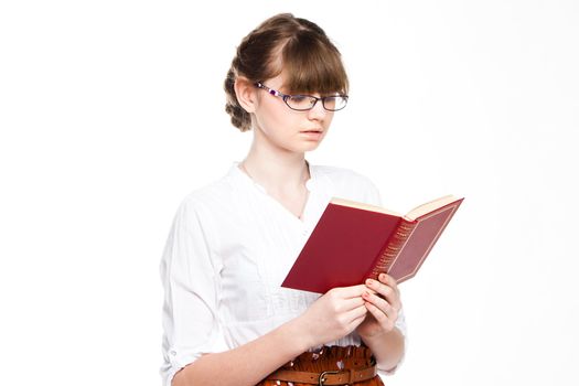 Portrait of a young and beautiful girl student who is preparing for exams