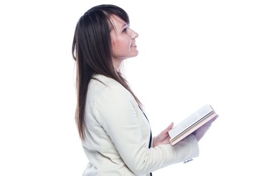 Portrait of a young and beautiful girl student who is preparing for exams