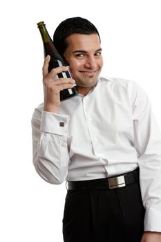 A happy man holding a wine bottle.  White background,