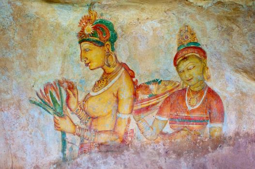 Antique asian fresco with two naked women, Sigiriya, Sri Lanka