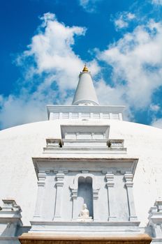 Buddha statue in white stupa Ruvanveli, Anuradhapura, Sri lanka