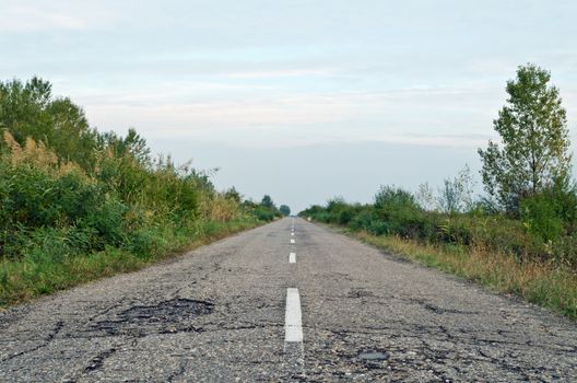 Old country asphalt road, horizontal shot