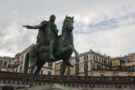 view, square and statues in Piazza Plebiscito, Naples, Italy