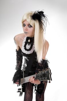 Gothic girl with artistic make-up, studio shot over white background 