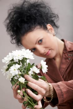 An image of a  beautiful woman with white flowers