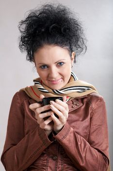 An image of beautiful girl drinking hot coffee